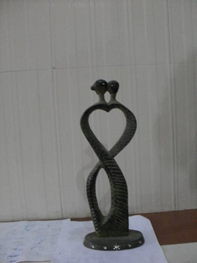 Manufacturers Exporters and Wholesale Suppliers of Sculptor Snake Romance S-33CM Moradabad Uttar Pradesh